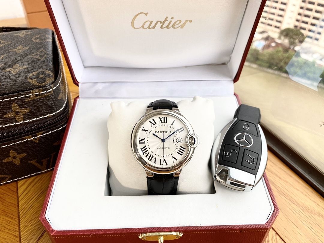 Cartier Round Watch with Black Strap and Silver-Tone Case